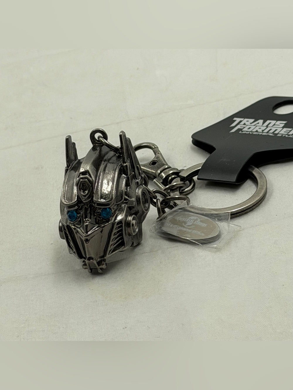 Universal Studios Transformers Optimus Prime Helmet Keychain with Blue Eyes